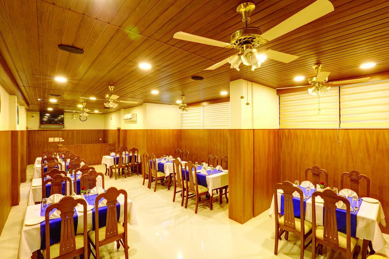 Hotel Floral Park Kottayam Buitenkant foto